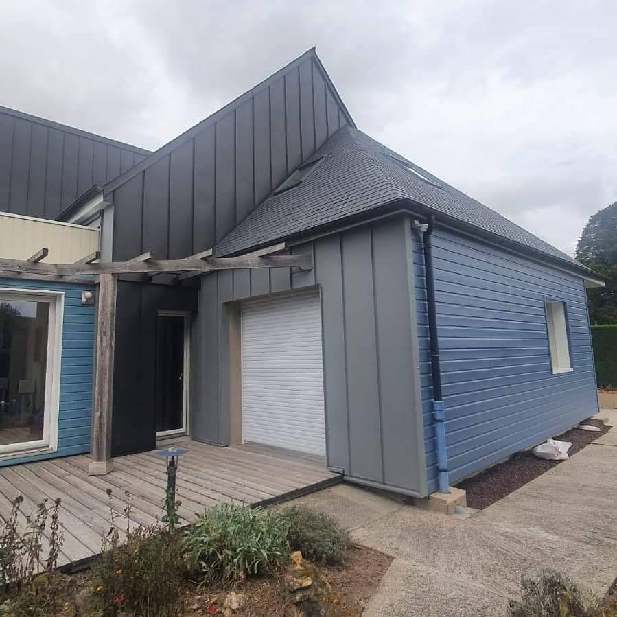 Faire appel à un professionnel de la rénovation énergétique pour un pavillon à Bernay 27
